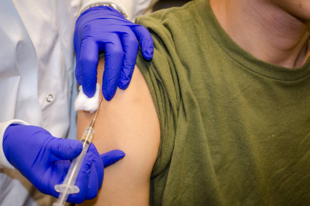 istock Injection of vaccine 887920290