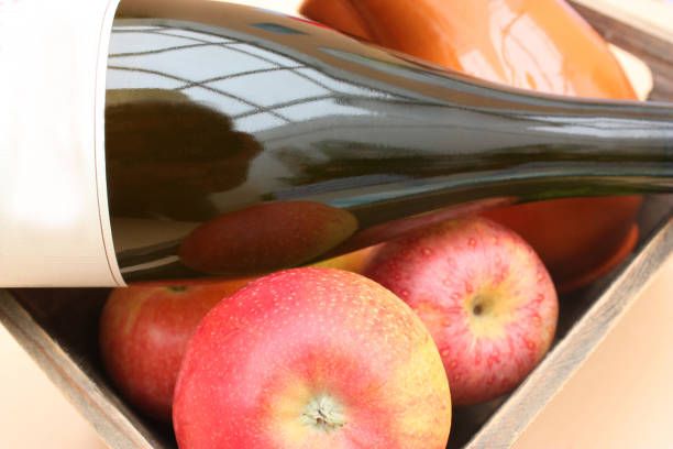 Bottle of cider  Clogged cider  Apples
