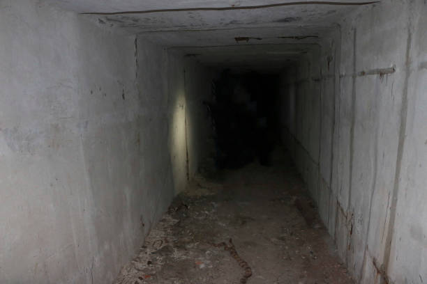 istock the old destroyed military base of missile forces after the explosions with the command post and the bomb shelter thrown in the woods 887921570