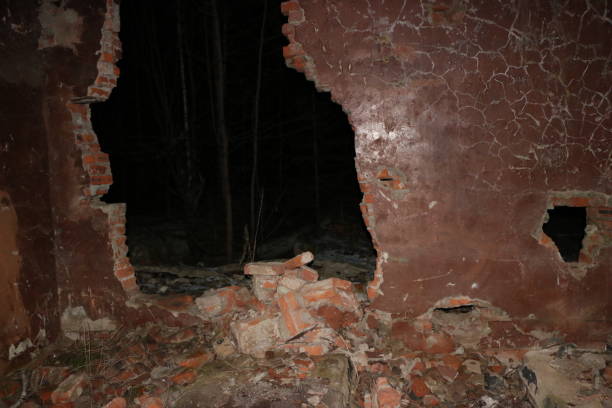 istock the old destroyed military base of missile forces after the explosions with the command post and the bomb shelter thrown in the woods 887921590