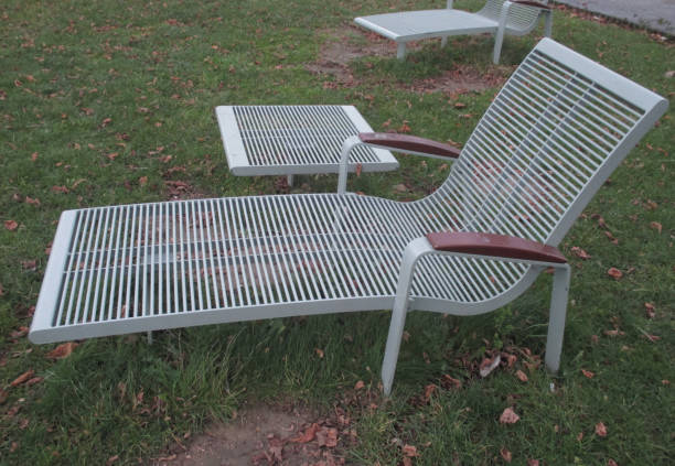 istock Garden seats in a public park 887924054