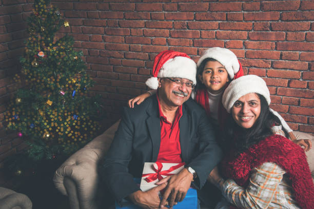 istock indian family celebrating christmas 887924696