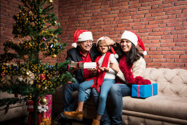 istock indian family celebrating christmas 887924840