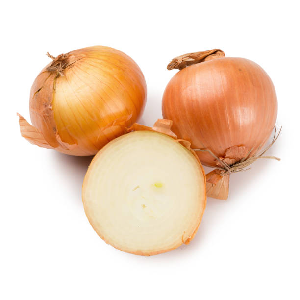 istock Fresh golden onions isolated on a white background 887927410