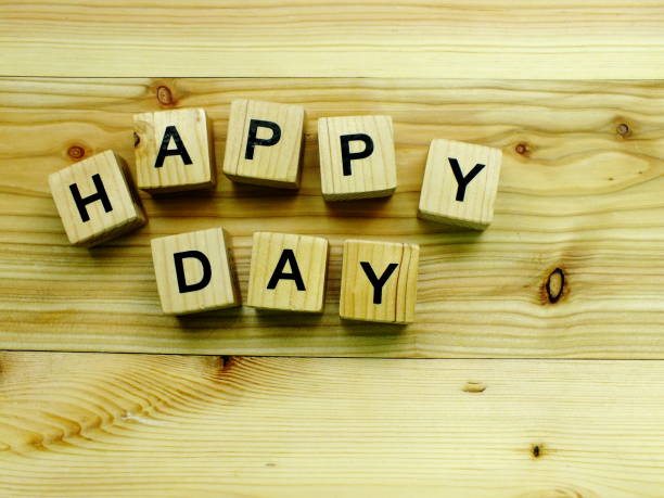 istock happy day wooden block 887930338
