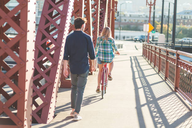 istock Pedestrians Walking on City Bridge 887937704