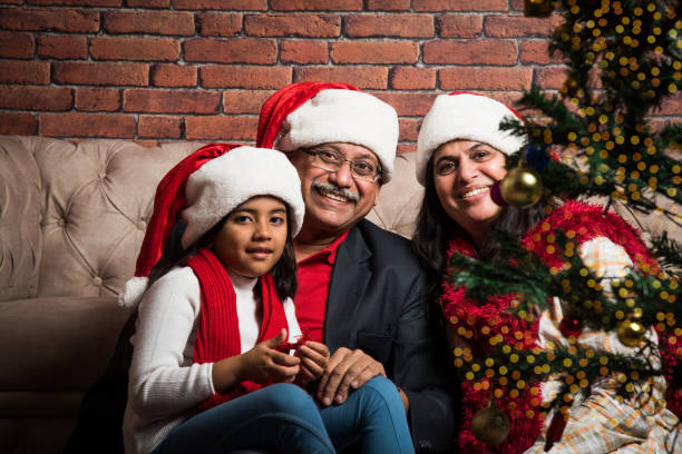 istock indian family celebrating christmas 887937732
