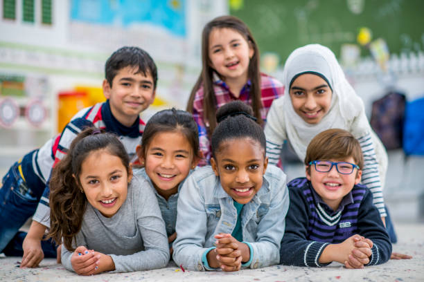 istock Group Of Kids In School 887938124