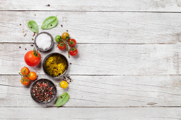 istock Tomatoes, basil, olive oil and spices 887954536