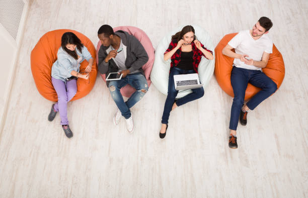 istock Coffee break, group of students preparing for exam 887959900