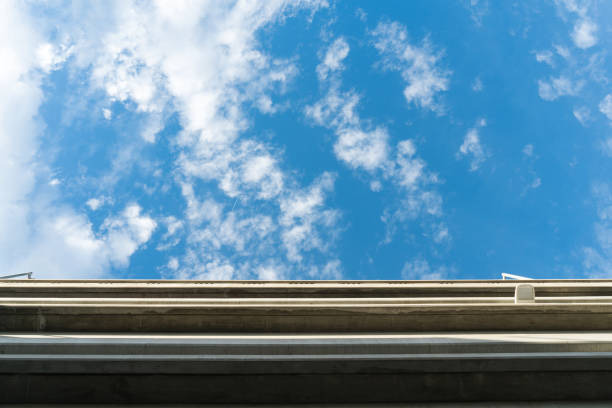Worm's eye view of express way or highway bridge with beautiful clear blue sky.