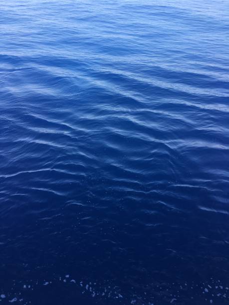 texture de l’eau de mer - deep focus photos photos et images de collection