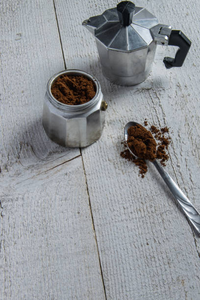 istock Preparing the coffee in a moka - italian coffee maker 887969438