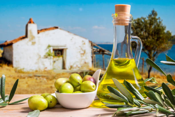 Olives Olives and leaves on the table in the garden. leaf epidermis stock pictures, royalty-free photos & images