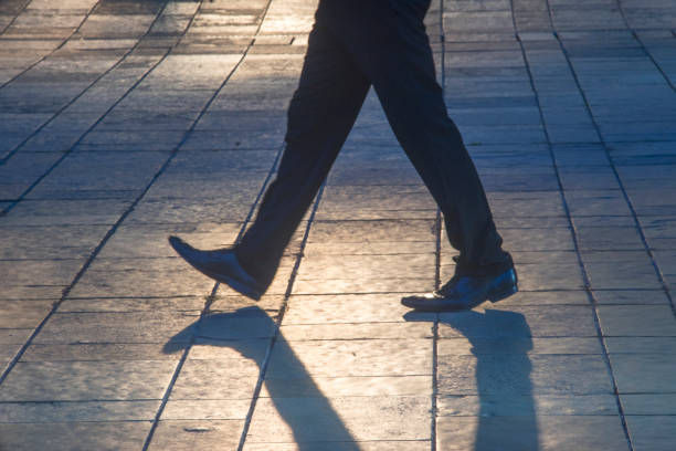 istock businessman on the sidewalk 887971162