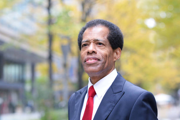 istock Mature businessman walking outside 887977084
