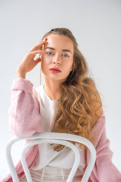 istock attractive girl with earring 887977580