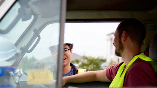 istock SYD112017 Diverse male construction workers communicating 887982272