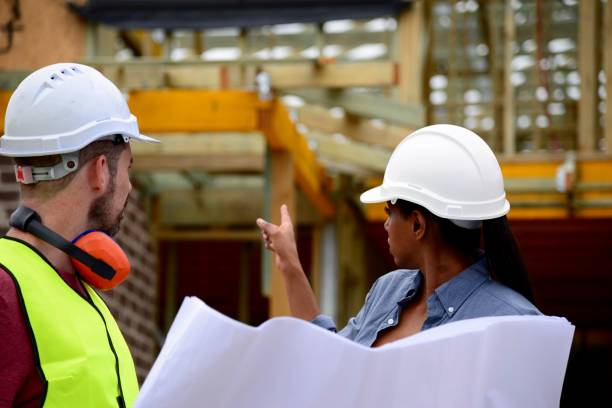 istock SYD112017 Meeting with architect and Construction Manager over building plans 887982546