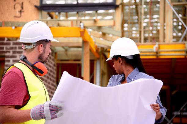 istock SYD112017 Meeting with architect and Construction Manager over building plans 887982654