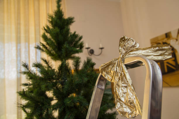 istock close up Christmas bow on the ladder 887987238