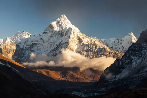Photo of Ama Dablam (6856m) peak near the village of Dingboche in the Khumbu area of Nepal, on the hiking trail leading to the Everest base camp.