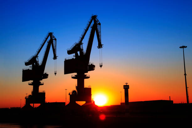 istock Wharf portal crane in the evening 888018706