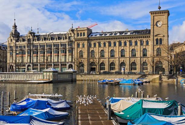 Zurich, Switzerland - 1 February, 2015: buildings of the city of Zurich along the Limmat rver. Zurich is the largest city in Switzerland and the capital of the Swiss canton of Zurich.