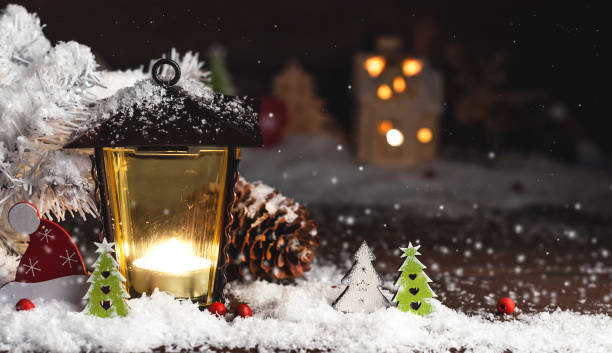 istock decorative Christmas ornaments, yellow lantern In the snow 888031356