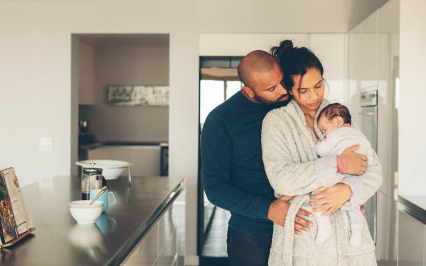 istock Parents spending time with newborn son in morning 888037694