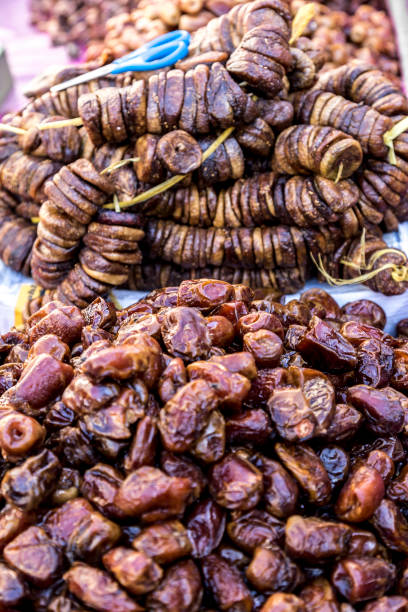 istock Bunches of dried dactyls on a market. 888044966