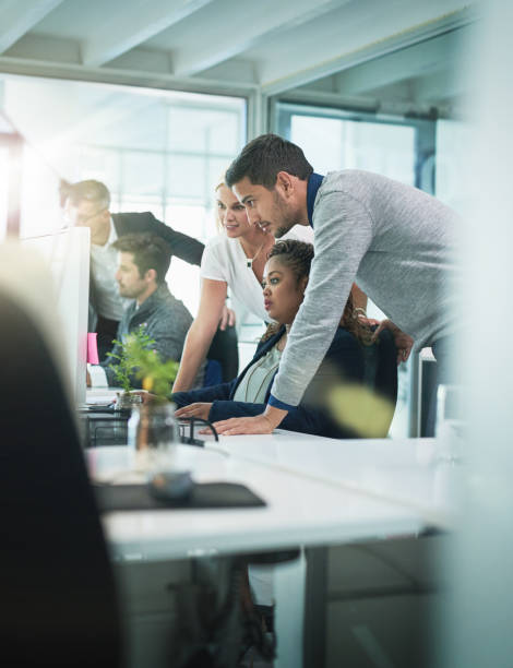 istock Putting their heads together 888048726