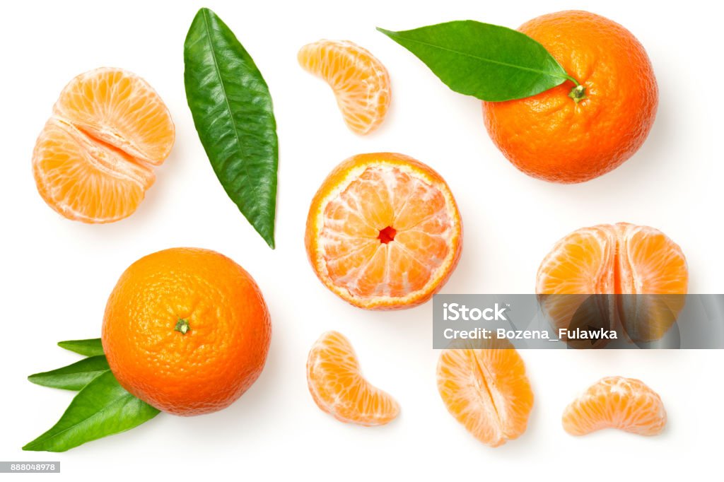 Mandarines Isolated on White Background Mandarines, tangerine, clementine with leaves isolated on white background. Top view Tangerine Stock Photo