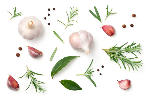 Garlic, Rosemary, Bay Leaves, Allspice, Pepper Isolated on White Background Garlic, rosemary, bay leaves, allspice and pepper isolated on white background. Flat lay. Top view garlic stock pictures, royalty-free photos & images