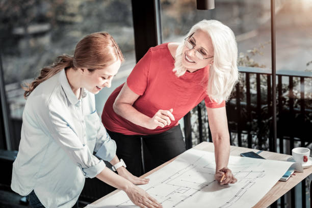 istock Positive professionals working at the big scheme 888049242