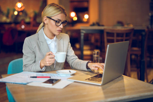istock Business woman working in cafe 888049402
