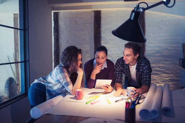 istock Female Leaders. Group of young architects working together in architecture studio 888051886