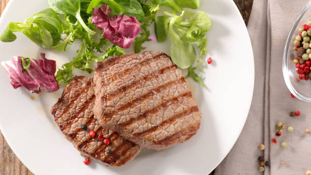 istock grilled beef steak and salad 888058658