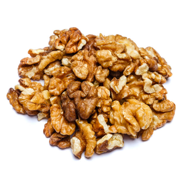 istock heap of shelled walnuts isolated on white background 888060818