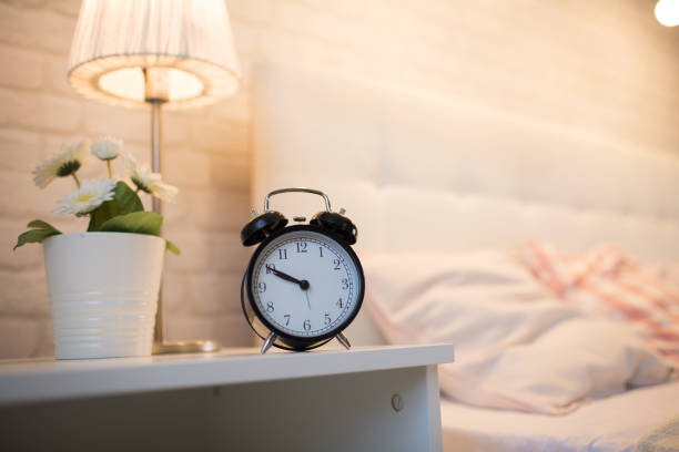 istock An alarm clock near the bed 888064228