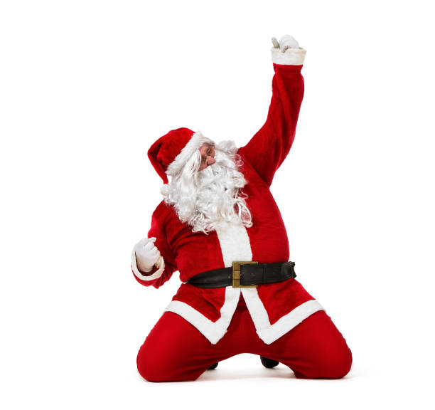 Happy Santa Claus Happy Santa Claus sliding on the knees isolated on white background christmas excitement stock pictures, royalty-free photos & images