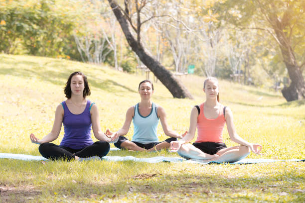 istock family doing yoga 888083130