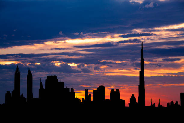 Dubai cityscape silhouette on sunset in UAE
