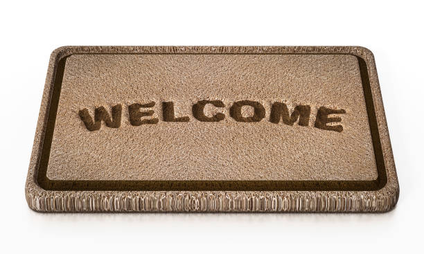 istock Door mat with welcome word isolated on white 888088074