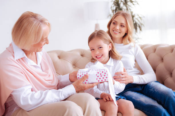 istock Delighted joyful girl receiving a gift 888090008
