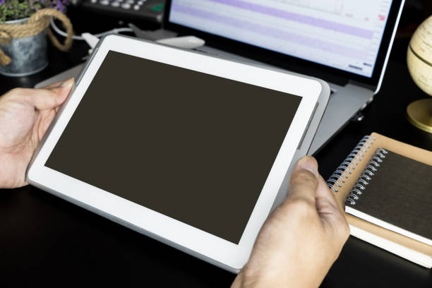 istock Business man holding blank tablet for online financial concept 888090270