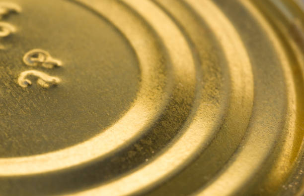 Food yellow tin cans a lid or Base of Food yellow tin cans, macro, close up can bottom stock pictures, royalty-free photos & images
