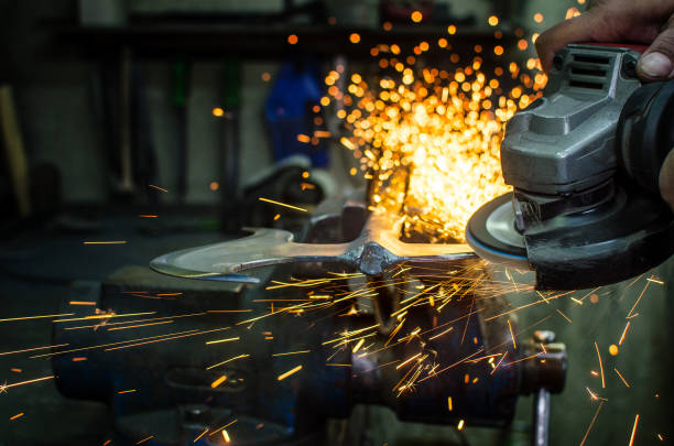 istock Industrial grinder showers sparks 888106094