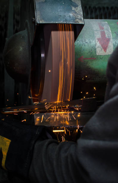 istock Industrial grinder showers sparks 888106136