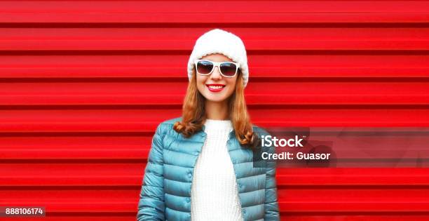 Fashion Portrait Pretty Smiling Woman On A Red Background Closeup Stock Photo - Download Image Now